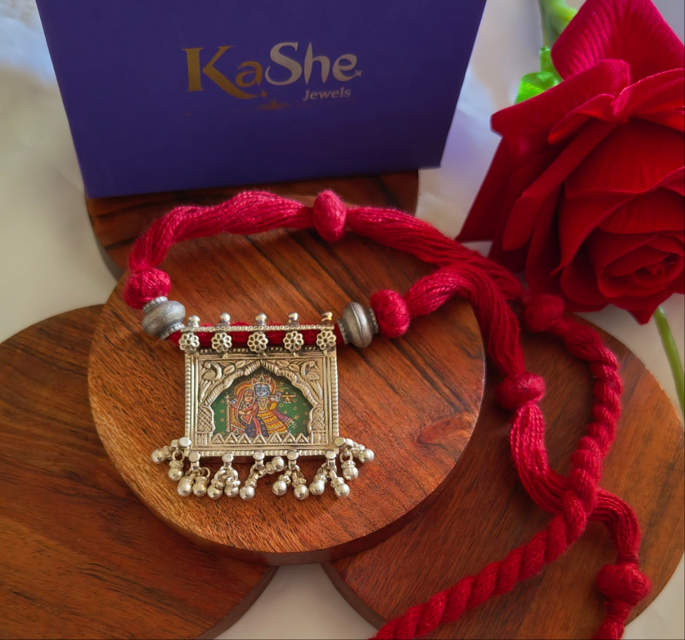 Radha Krishna Hand Painted Jharoka Pendant with Silver Ball Danglers and Maroon Thread Necklace Green Bg