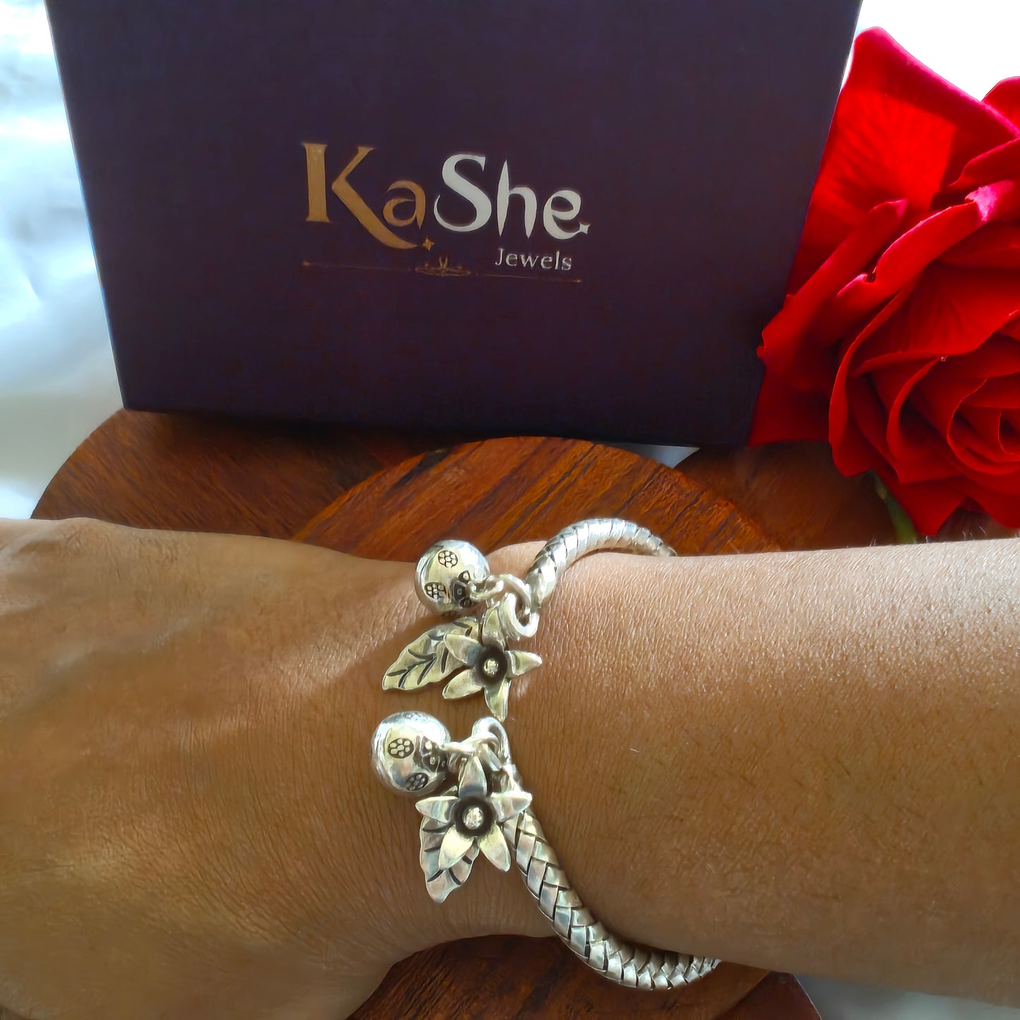 Exclusive Braided Sterling Silver Charms Kada With Leaves, Flowers And Ghungroo