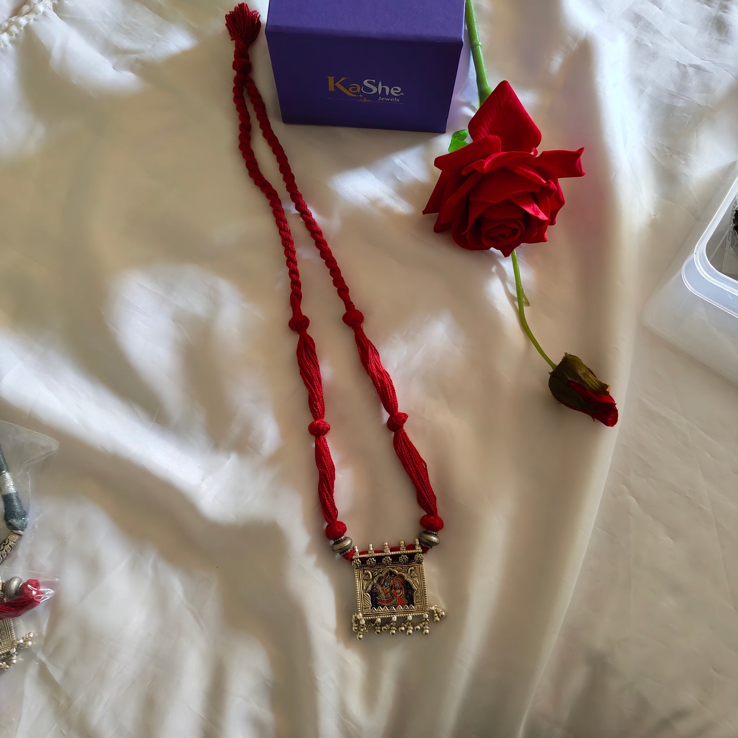 Radha Krishna Hand Painted Jharoka Pendant with Silver Ball Danglers and Maroon Thread Necklace Blue Bg