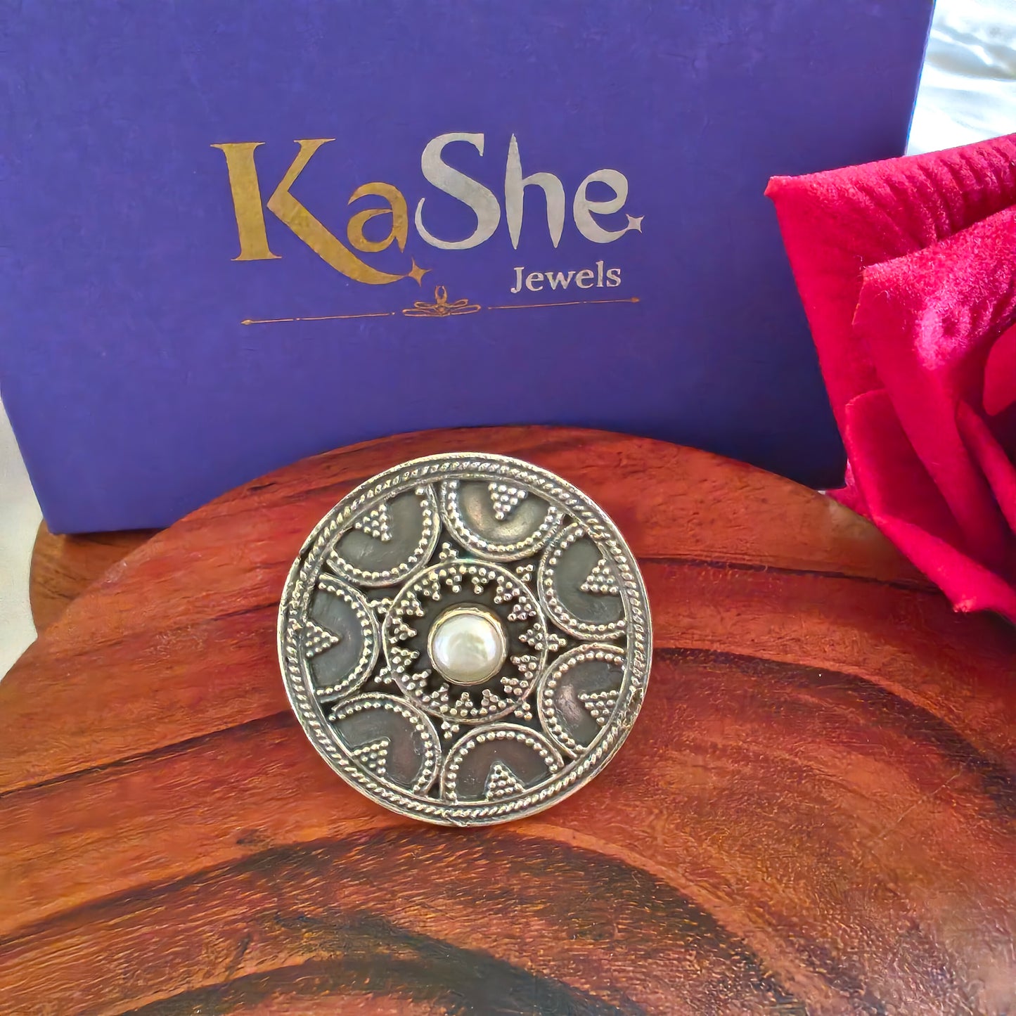 Circular Ring With Embossed Rava Design And Pearl