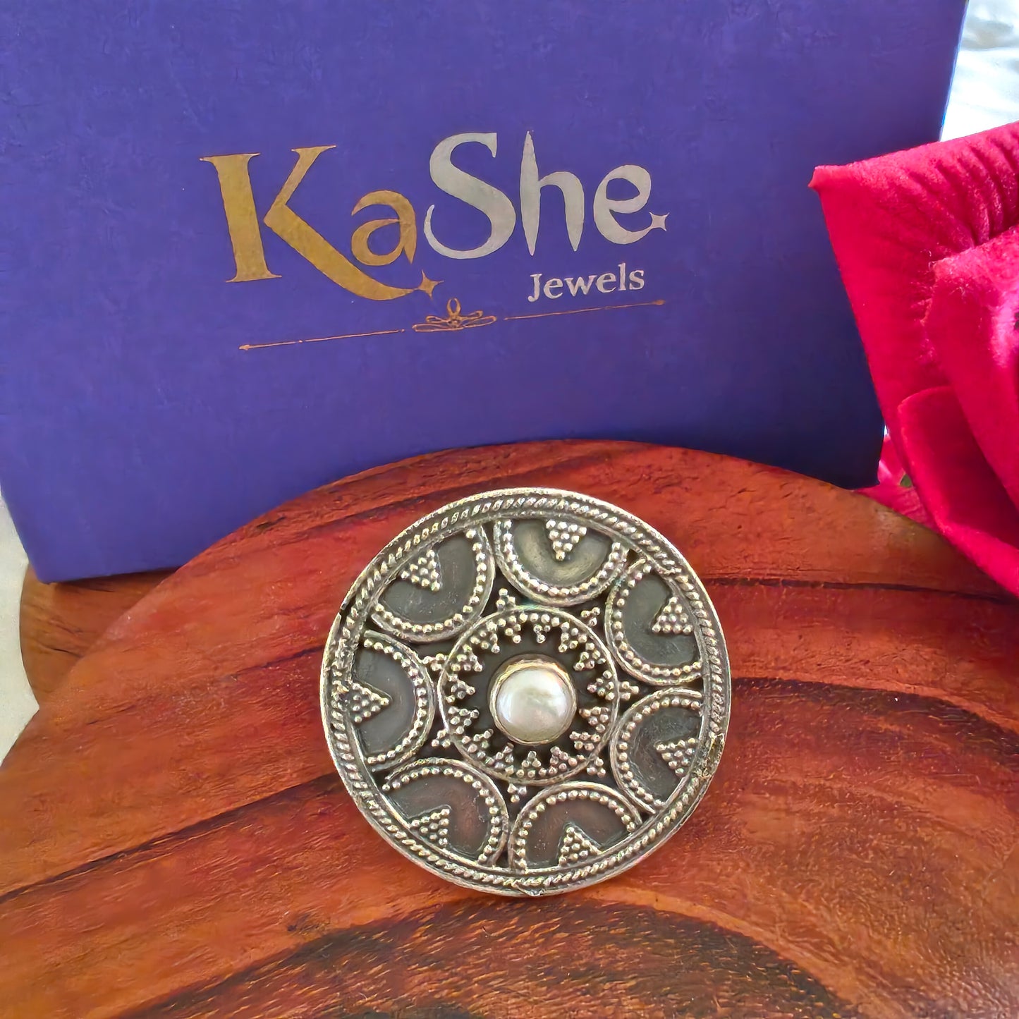 Circular Ring With Embossed Rava Design And Pearl