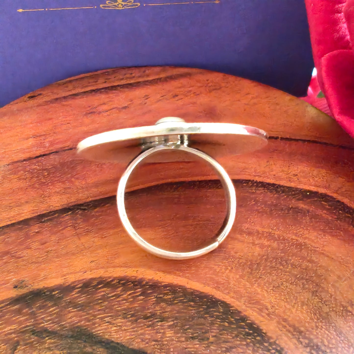 Circular Ring With Embossed Rava Design And Pearl