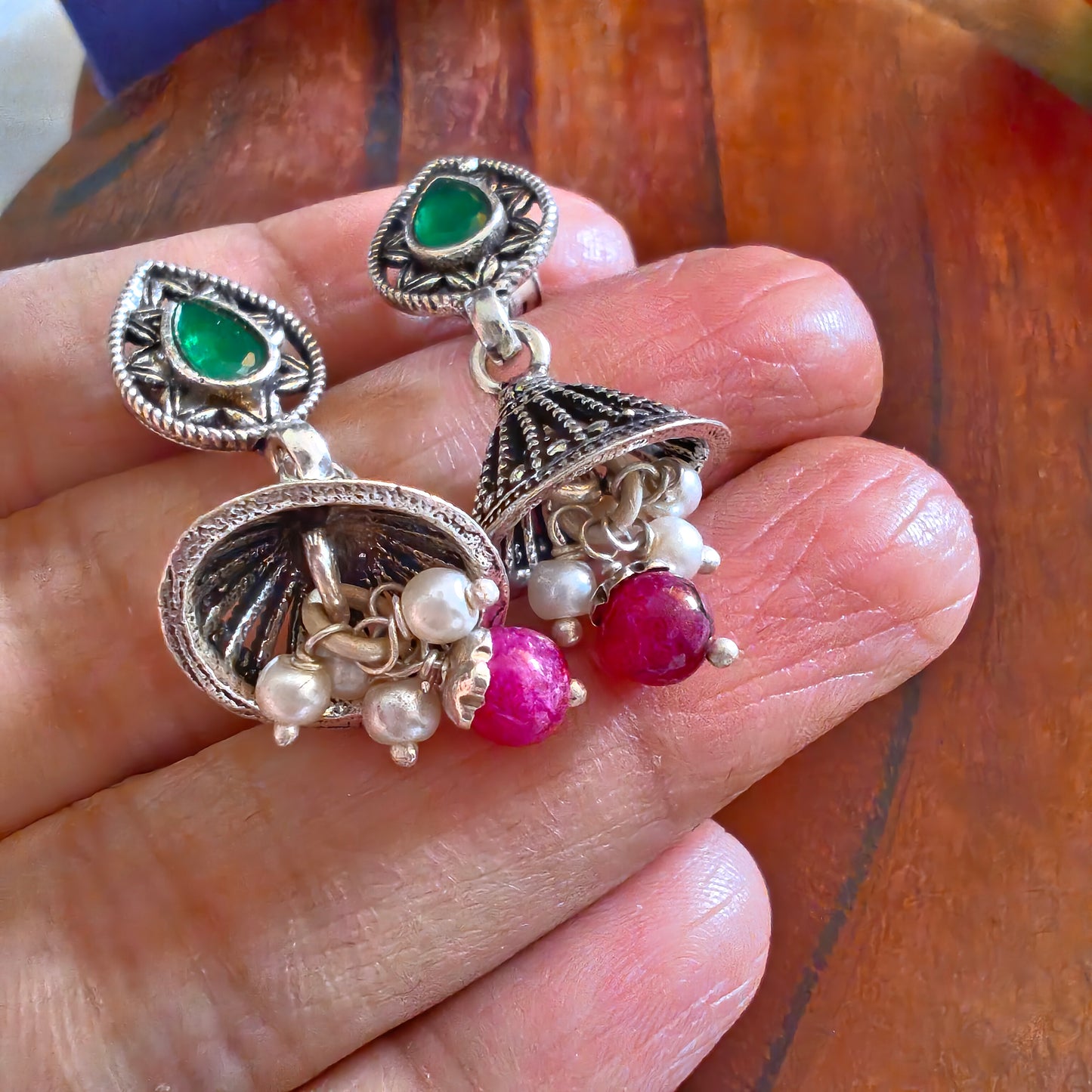 Elegant Pear Intricate Stud Green And Pink Stone Jhumki Earrings With Bud Pearl And Stone Drops