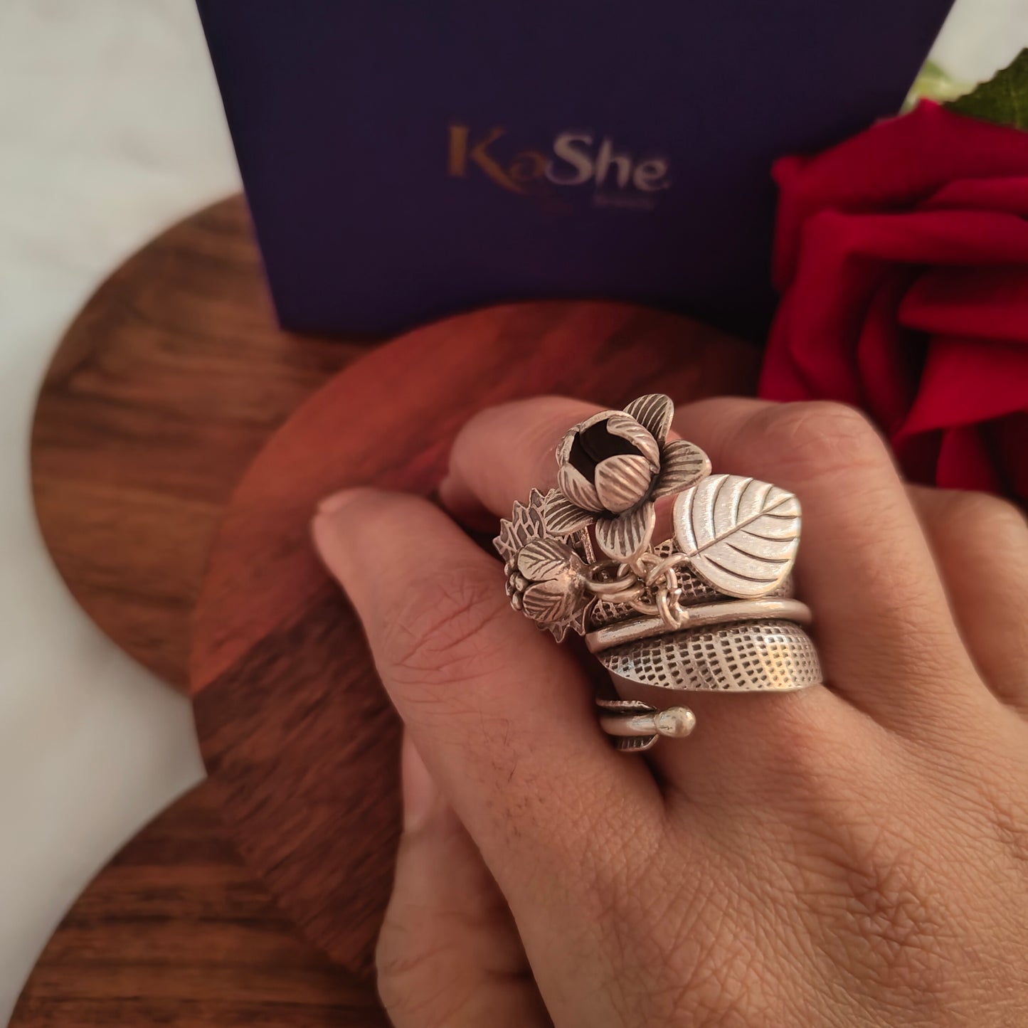 Statement Boho Textured Spiral Fish Ring With Charms Flowers And Leaves