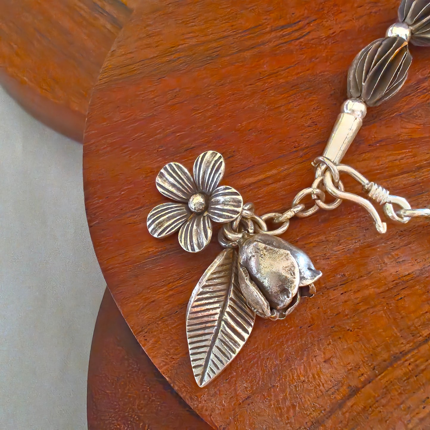 Exquisite Loose Bracelet Oxidised Polished With Flowers Bud And Leaf Charms