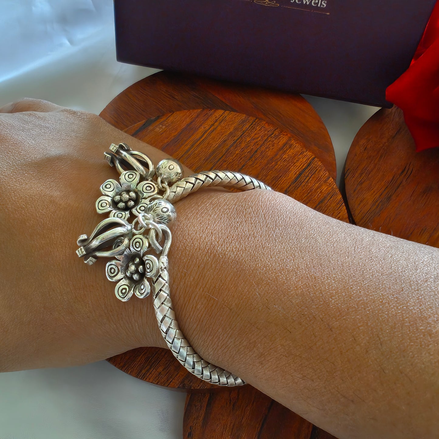 Exclusive Braided Sterling Silver Charms Kada With Bud, Ghungroo And Flowers