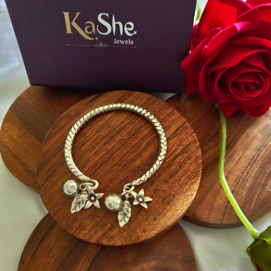 Exclusive Braided Sterling Silver Charms Kada With Leaves, Flowers And Ghungroo