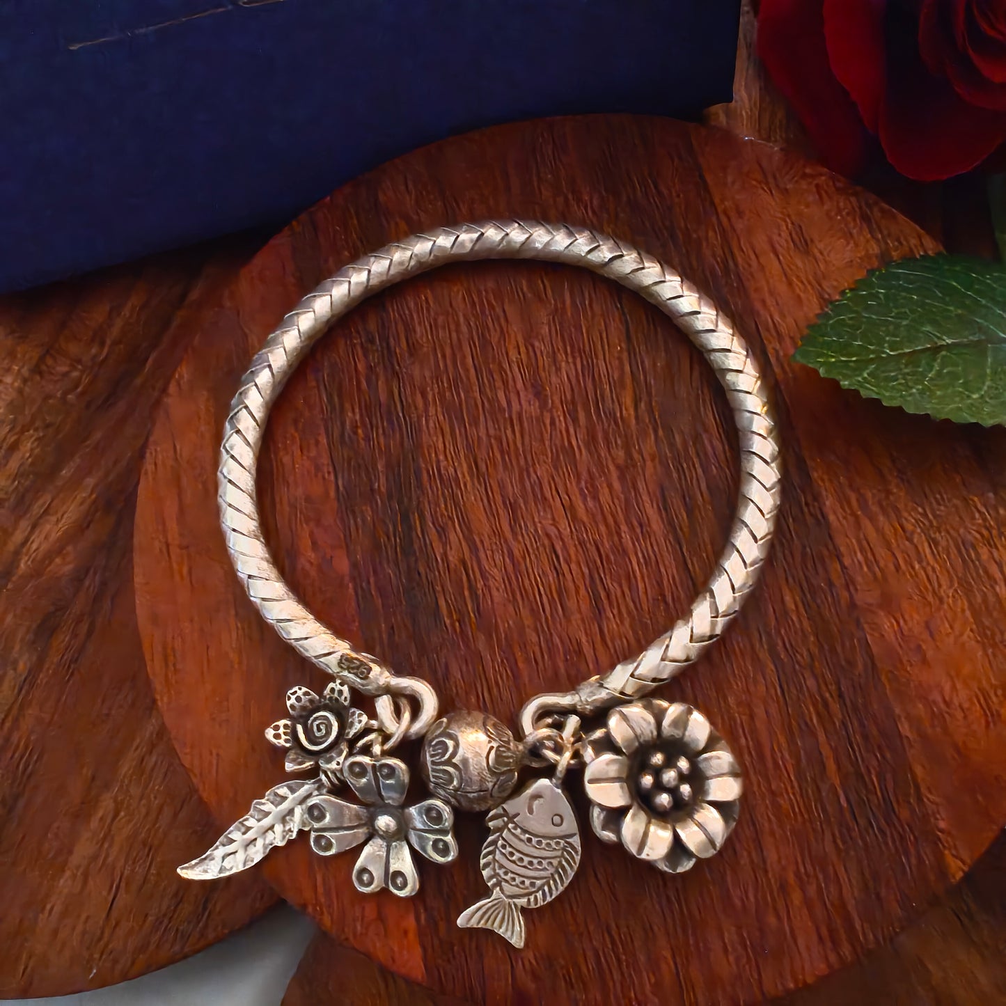 Exclusive Braided Sterling Silver Charms Kada With Fish, Leaf, Bud, Ghungroo And Flowers