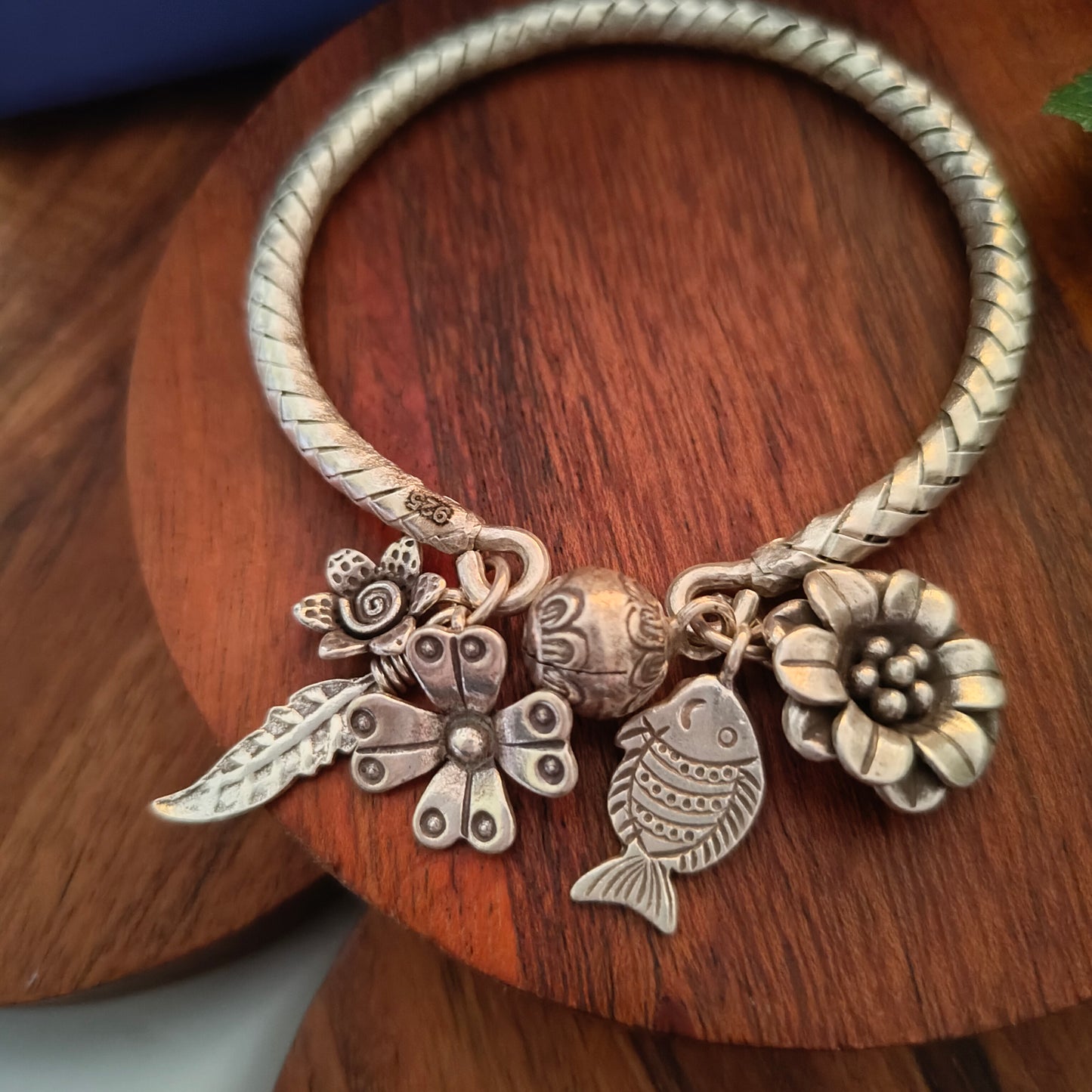 Exclusive Braided Sterling Silver Charms Kada With Fish, Leaf, Bud, Ghungroo And Flowers