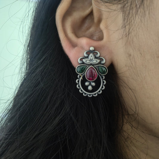 Intricate Handcrafted Pink and Green Stone Studs Silver Temple Stud Earrings