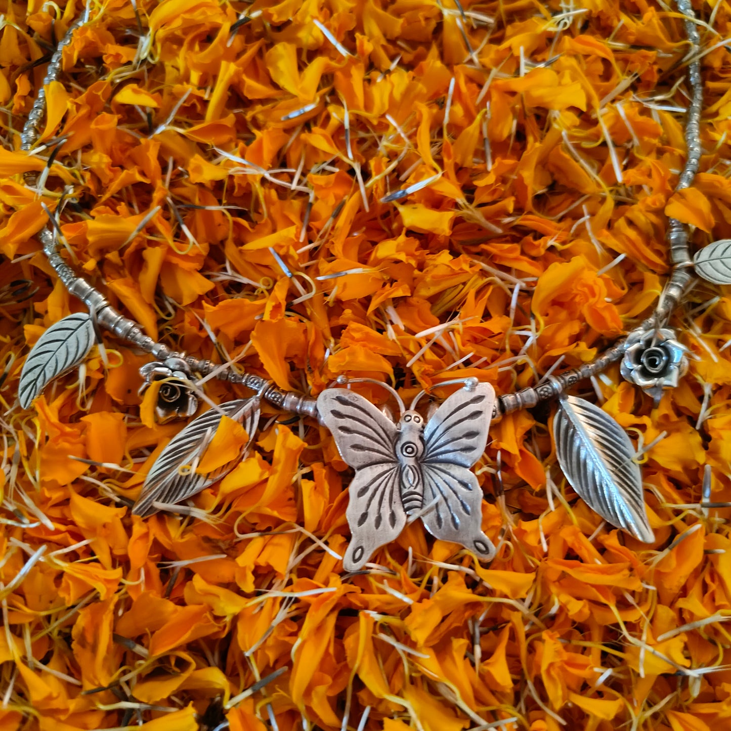 Statement Necklace with Handcrafted Butterfly Rose And Leaves Motifs Charms With Beaded Chain