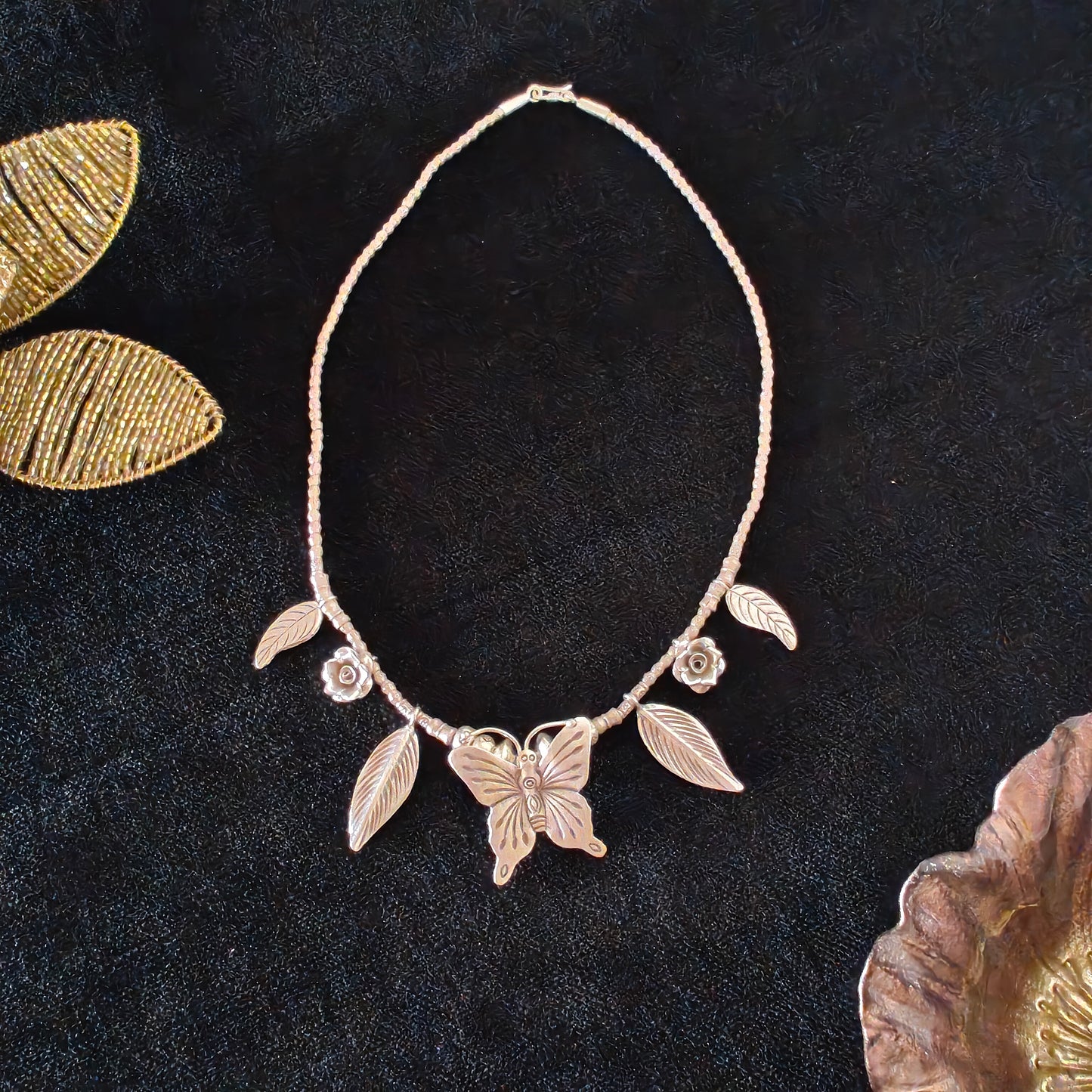 Statement Necklace with Handcrafted Butterfly Rose And Leaves Motifs Charms With Beaded Chain