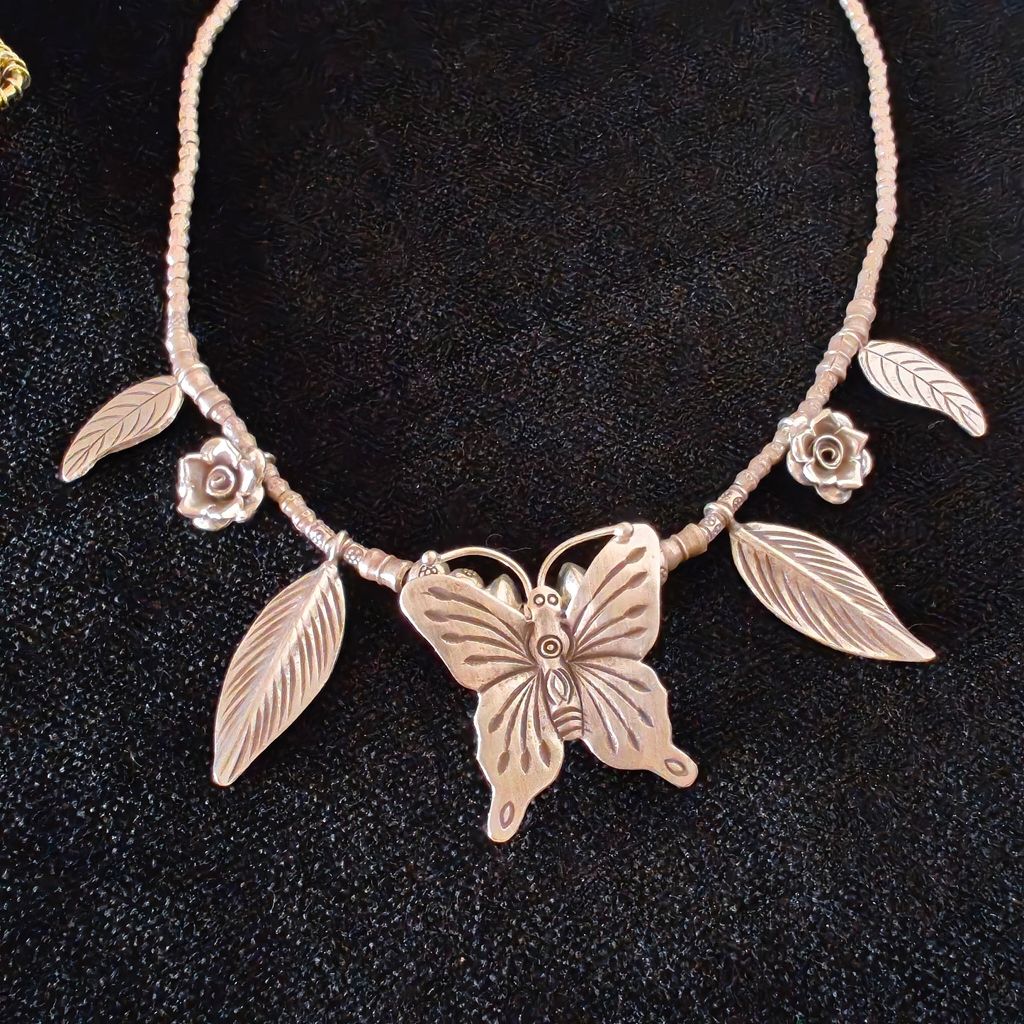 Statement Necklace with Handcrafted Butterfly Rose And Leaves Motifs Charms With Beaded Chain