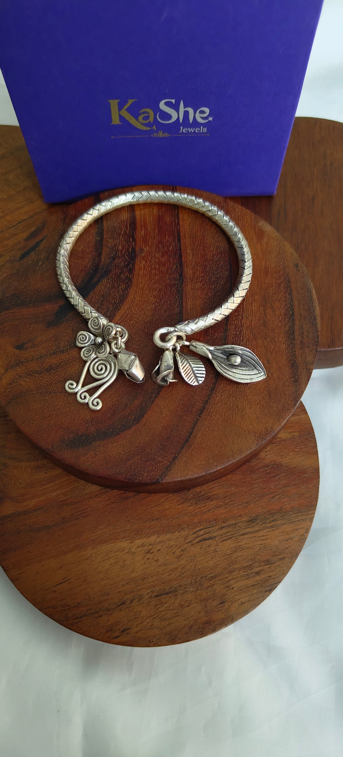 Exclusive Braided Sterling Silver Charms Kada With  Flowers, Leaves Buds