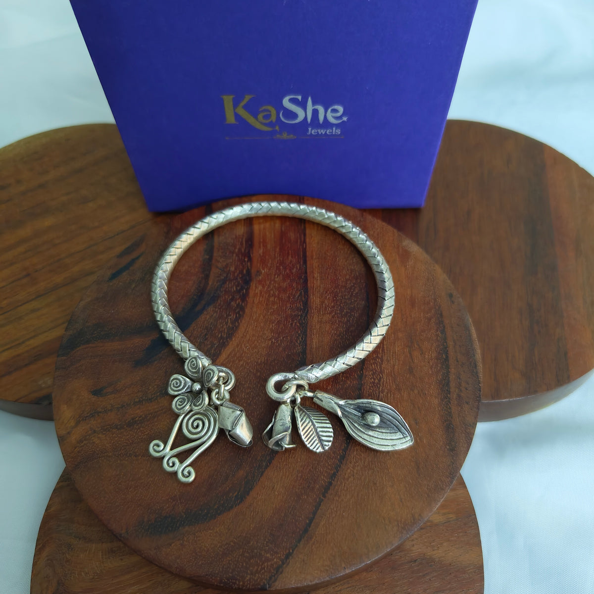 Exclusive Braided Sterling Silver Charms Kada With  Flowers, Leaves Buds