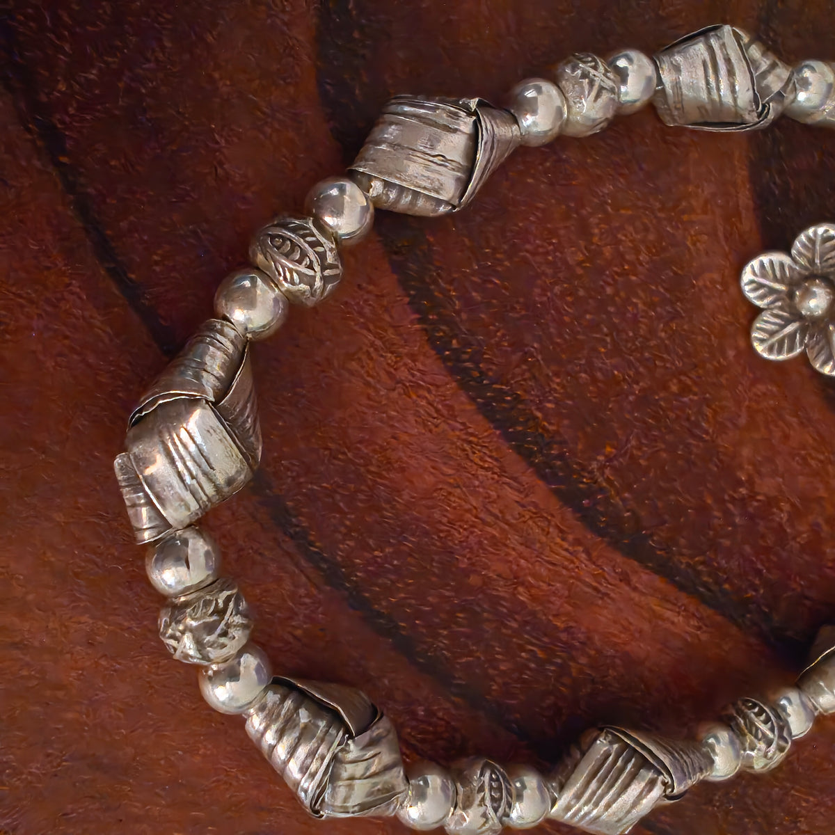 Exquisite Statement Loose Bracelet With Textured  Knotted Balls Flower Charms