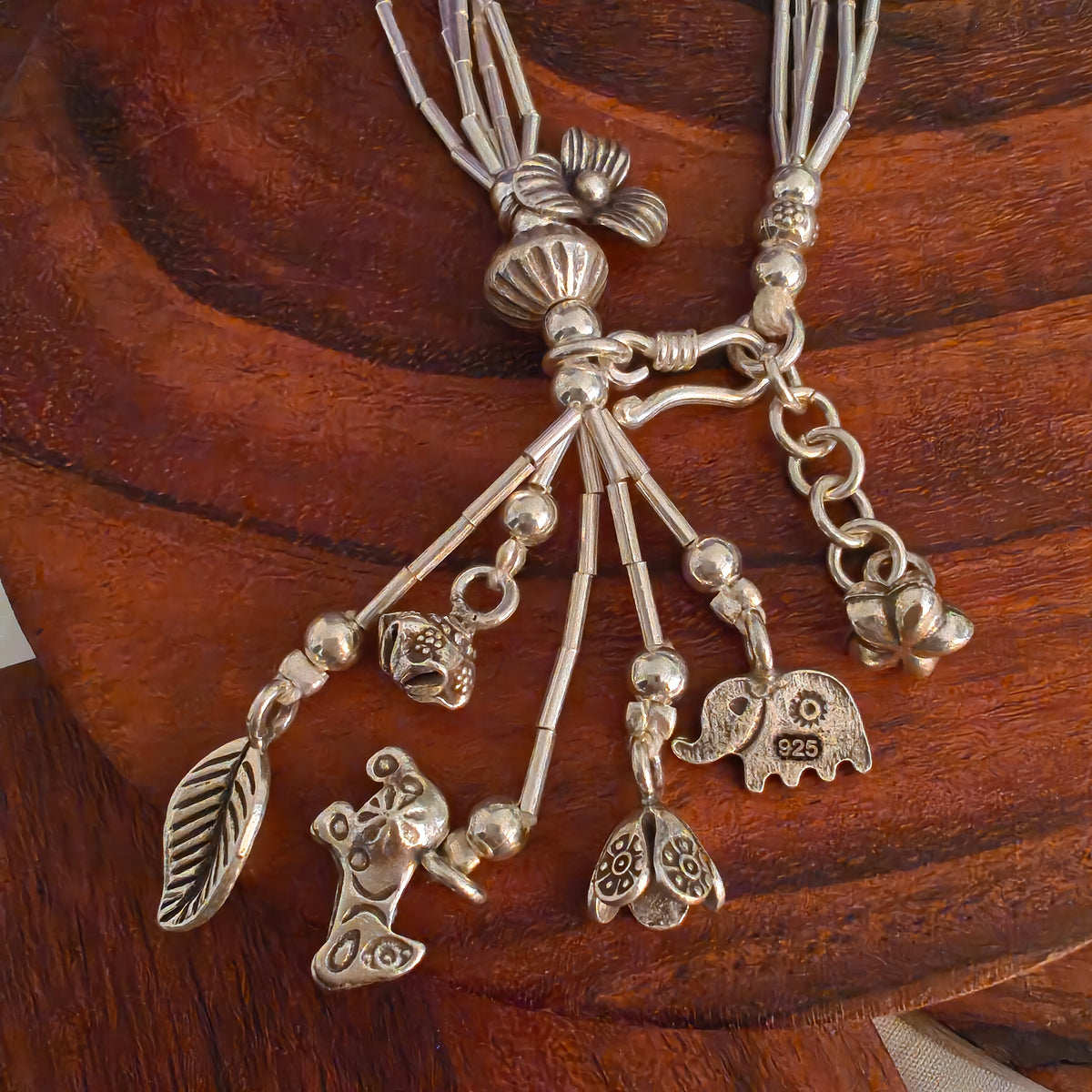 Exquisite Statement Loose Bracelet With Elephant, Leaf Flowers Bud Horse Charms (Five-layered)
