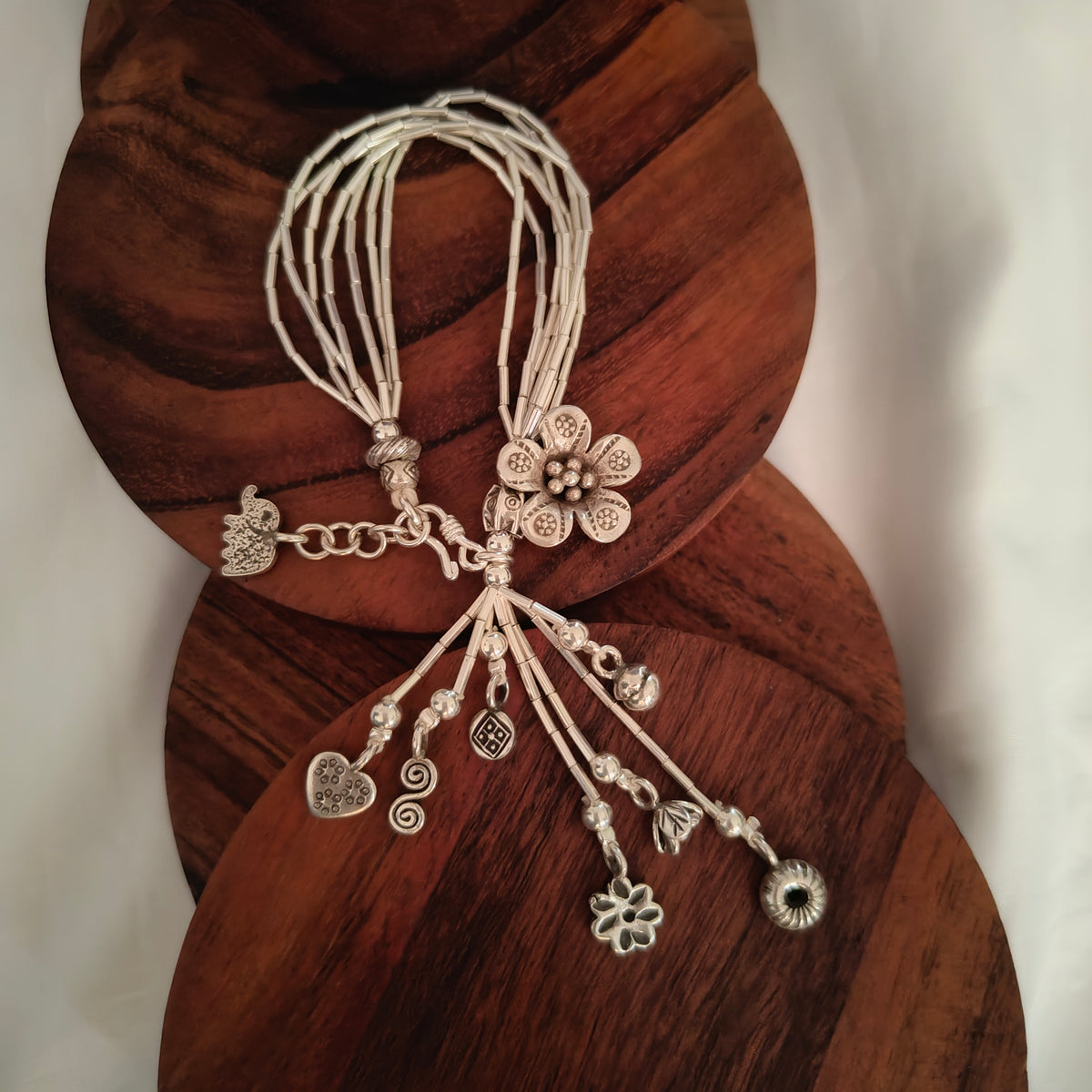 Exquisite Statement Loose Bracelet With Elephant, Leaf Flowers Bud Spiral Heart Charms (Seven-layered)