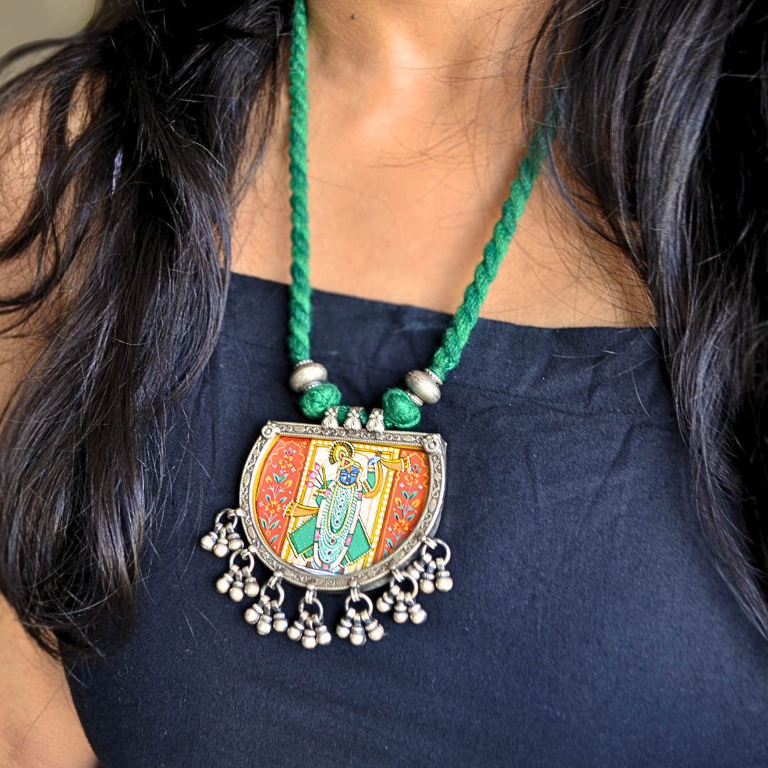 Shreenathji Hand Painted Pendant with Silver Ball Danglers and Green Thread Dori Necklace